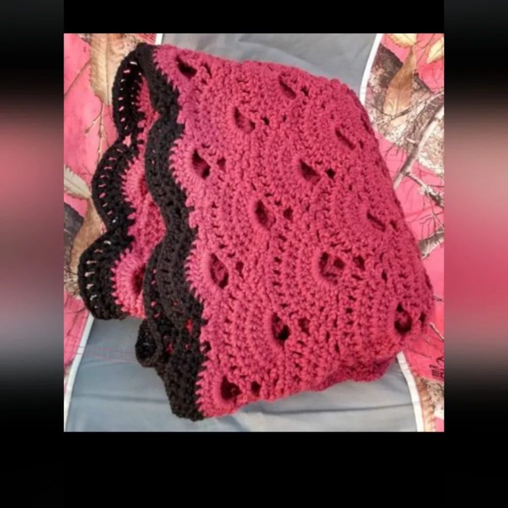 Square crocheted blanket in plum, magenta and black